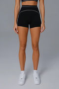 Woman wearing black athletic shorts 