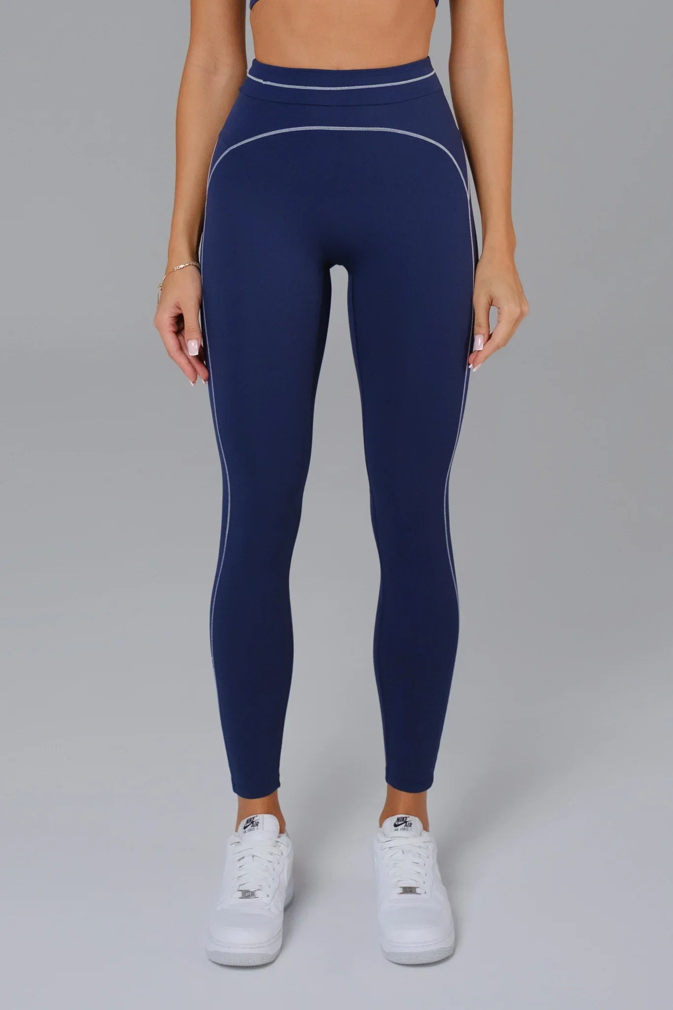 woman wearing leggings in Navy Blue