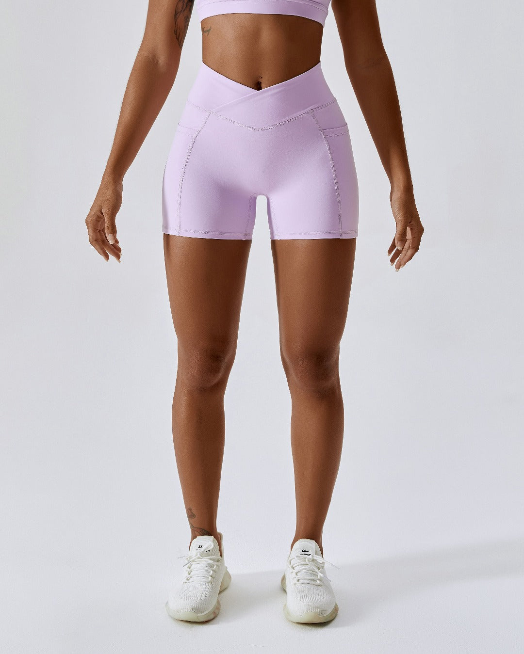 Lilac crossover scrunch bum mini shorts with pockets
