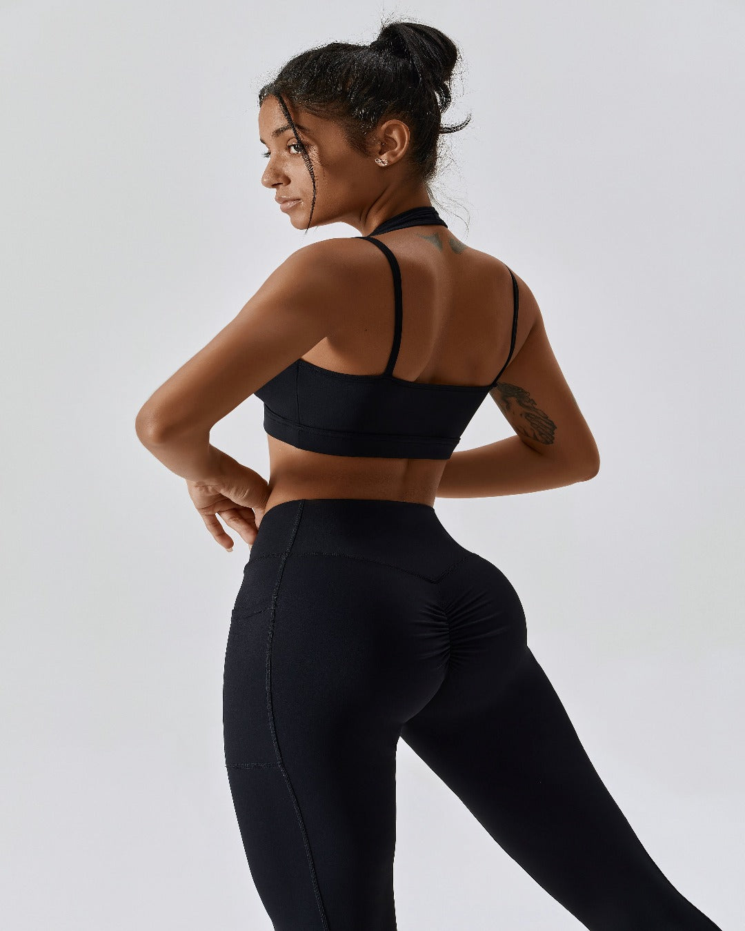 Black crossover scrunch bum leggings with pockets