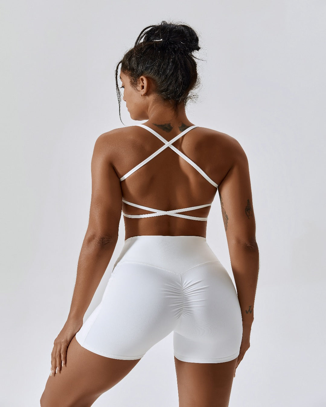 White crossover scrunch bum rear enhancing mini shorts with pockets 