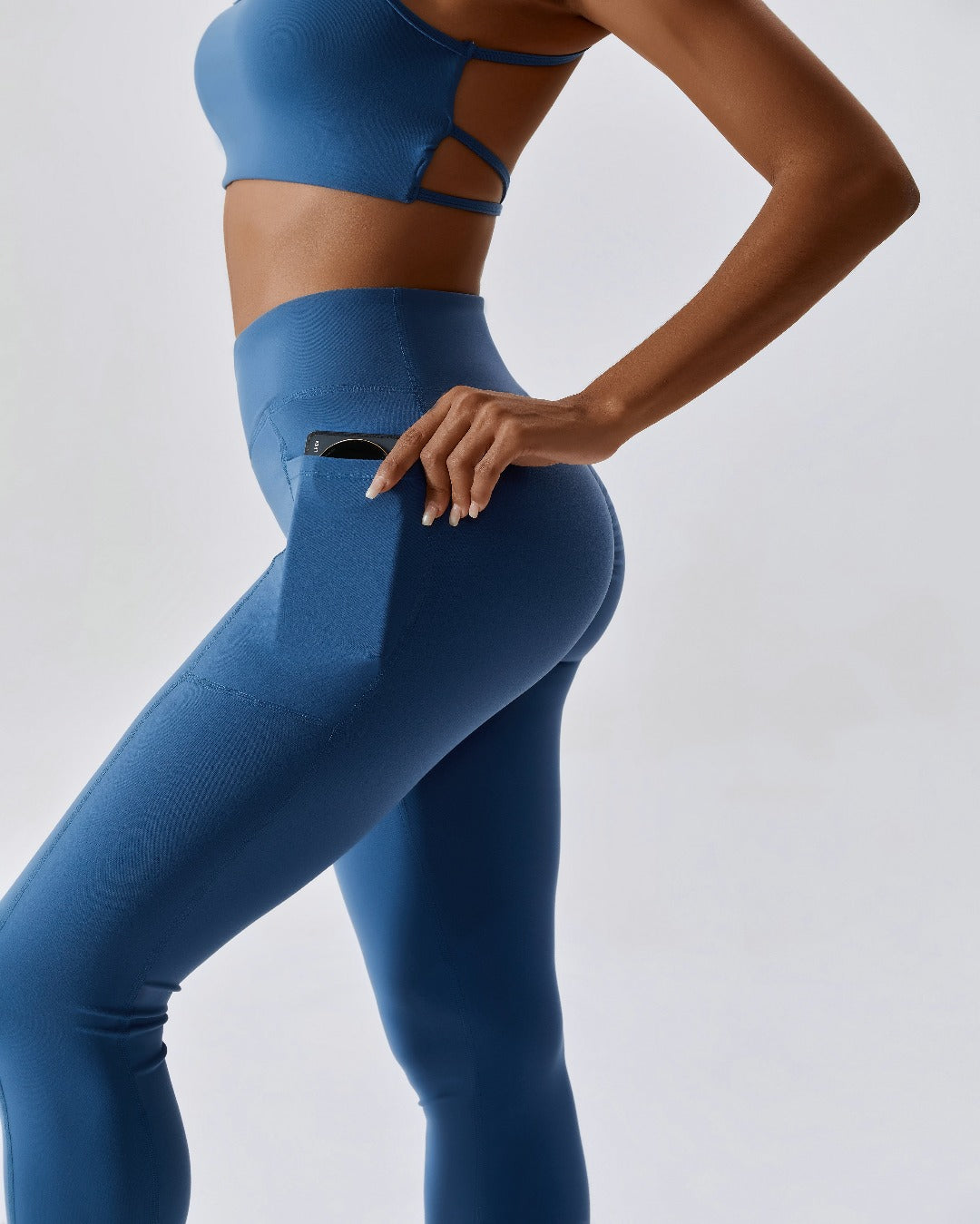 blue crossover scrunch bum leggings with pockets